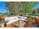 Charming wooden deck featuring outdoor furniture and scenic neighborhood views at 3939 Archer Notch Ln, Huntersville, NC 28078