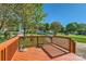 Wooden deck with a view of the yard and neighborhood trees at 3939 Archer Notch Ln, Huntersville, NC 28078