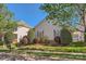 Charming single-story home with well-manicured lawn, landscaping, and inviting curb appeal at 3939 Archer Notch Ln, Huntersville, NC 28078