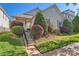 Charming home featuring mature landscaping and a welcoming front entrance with decorative shrubs at 3939 Archer Notch Ln, Huntersville, NC 28078
