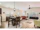 Living and dining area with many windows and wood floors at 3939 Archer Notch Ln, Huntersville, NC 28078
