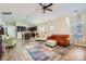Spacious living room flowing into kitchen with hardwood floors and plentiful seating at 3939 Archer Notch Ln, Huntersville, NC 28078