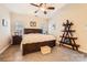 This main bedroom features a ceiling fan, and wood flooring at 3939 Archer Notch Ln, Huntersville, NC 28078