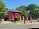 Caboose at Huntersville, featuring a red train car with stone pillars and landscaping at 3939 Archer Notch Ln, Huntersville, NC 28078