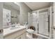 Bathroom with a glass-enclosed shower, single sink vanity, and a toilet with a bidet at 4083 Home Grown Way, Clover, SC 29710