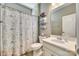 Bathroom with a floral shower curtain and plenty of natural light at 4083 Home Grown Way, Clover, SC 29710
