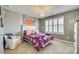 Cozy bedroom with a chandelier, natural light, and fun decor at 4083 Home Grown Way, Clover, SC 29710