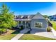Well-designed community clubhouse with a covered porch and inviting entrance, great for gatherings at 4083 Home Grown Way, Clover, SC 29710