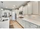 Bright kitchen with stainless steel appliances, white cabinetry, and ample countertop space at 4083 Home Grown Way, Clover, SC 29710