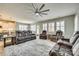 Expansive living room featuring modern furniture, abundant natural light and neutral decor at 4083 Home Grown Way, Clover, SC 29710