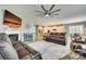 Open-concept living room showcasing a fireplace, modern furniture, and seamless flow into the kitchen at 4083 Home Grown Way, Clover, SC 29710