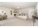 Serene main bedroom offers neutral tones, a fireplace, and soft carpet flooring at 426 Walden Trl, Waxhaw, NC 28173