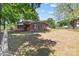 Brick home with a fenced backyard and large mature trees in a spacious outdoor setting at 4734 Polk Ford Rd, Stanfield, NC 28163