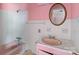 Bathroom with pink sink and tub at 4734 Polk Ford Rd, Stanfield, NC 28163