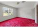 Bedroom with red carpet, and closet at 4734 Polk Ford Rd, Stanfield, NC 28163