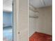 A look inside a closet with shelving and a rod for hanging clothes, needs some TLC at 4734 Polk Ford Rd, Stanfield, NC 28163