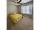 Bright bedroom featuring curtains, neutral walls, carpet floors and a ceiling fan at 5012 Wheat Sw Dr, Concord, NC 28027