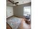 Neutral bedroom showcasing carpet floors and ceiling fan at 5012 Wheat Sw Dr, Concord, NC 28027