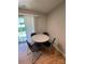 Cozy dining area with a table and chairs, adjacent to a sliding glass door at 5012 Wheat Sw Dr, Concord, NC 28027