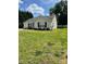 Well-maintained single-story home with lush front lawn, offering a serene and inviting atmosphere at 5012 Wheat Sw Dr, Concord, NC 28027