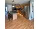 Spacious kitchen featuring stainless steel appliances, wood cabinets, and an island with seating at 5012 Wheat Sw Dr, Concord, NC 28027