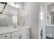 Bright bathroom featuring double vanity, sleek mirror, and modern fixtures at 5027 Mclaughlin Loop # 61, Waxhaw, NC 28173