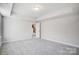 Carpeted bedroom with recessed lighting and access to an upstairs landing or hall at 5027 Mclaughlin Loop # 61, Waxhaw, NC 28173