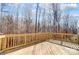 Large wood deck overlooking a wooded backyard at 5027 Mclaughlin Loop # 61, Waxhaw, NC 28173