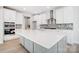 Spacious kitchen with a large center island, white countertops, and modern fixtures at 5027 Mclaughlin Loop # 61, Waxhaw, NC 28173