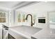 Bright kitchen open to the living room, featuring a large island and modern appliances at 5027 Mclaughlin Loop # 61, Waxhaw, NC 28173