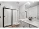 Modern bathroom with tiled walk-in shower and sleek vanity sink at 5031 Mclaughlin Loop # 60, Waxhaw, NC 28173