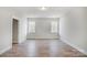 Bedroom features hardwood floors, ample natural light, and neutral paint at 5031 Mclaughlin Loop # 60, Waxhaw, NC 28173