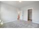 Neutral bedroom with a view of the bathroom and a walk-in closet at 5031 Mclaughlin Loop # 60, Waxhaw, NC 28173