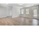 Bright open living room with light wood floors and a back door at 5031 Mclaughlin Loop # 60, Waxhaw, NC 28173