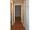 The hallway offers wood-look flooring and neutral paint, ready for customization at 510 Belmont Mount Holly Rd, Belmont, NC 28012