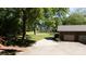 Backyard featuring an oversized two car garage and a large grassy lawn at 567 Willie Ln, York, SC 29745