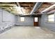 Unfinished basement space with exposed ceiling, and concrete block walls at 567 Willie Ln, York, SC 29745