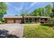 Charming single story brick home with attached two-car garage, landscaped front yard, and ample parking at 567 Willie Ln, York, SC 29745