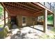 Shaded patio with brick walls, perfect for outdoor relaxation and entertaining at 567 Willie Ln, York, SC 29745