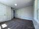 Bedroom showcasing soft, neutral carpet, clean white walls, and natural light at 589 Fork Rd, Norwood, NC 28128