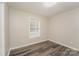 This bedroom features modern flooring and a window for natural light at 592 Rambo E Rd, Rock Hill, SC 29730