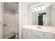 White bathroom featuring updated vanity, mirror and floors at 721 Summerwood Dr, Rock Hill, SC 29732