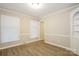 An interior room featuring new floors, two windows and white trim at 721 Summerwood Dr, Rock Hill, SC 29732