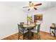 Dining room featuring a round table with seating for four and a stylish ceiling fan at 7407 Mystic Ln, Charlotte, NC 28227