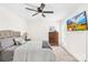 Spacious main bedroom featuring soft natural light, a ceiling fan, and neutral décor at 7407 Mystic Ln, Charlotte, NC 28227