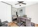 Office space with ceiling fan, modern desk, neutral walls, and an area rug at 7407 Mystic Ln, Charlotte, NC 28227