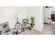 Cozy sitting area with floral chairs and a lamp, offering a comfortable space at 7407 Mystic Ln, Charlotte, NC 28227
