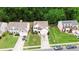 Aerial view of a suburban home with a well-maintained lawn and a two-car garage at 8800 Darcy Hopkins Dr, Charlotte, NC 28277