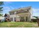 Spacious backyard featuring a covered patio perfect for outdoor entertaining at 8800 Darcy Hopkins Dr, Charlotte, NC 28277