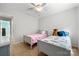 Shared bedroom with two twin beds, carpet, and neutral walls at 8800 Darcy Hopkins Dr, Charlotte, NC 28277